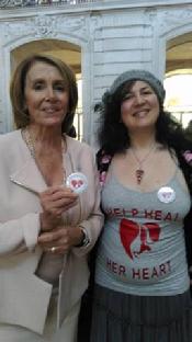Hon.Nancy Pelosi, Speaker of US House of Representatives  shows enthusiastic support to Rozalina Gutman, holding the pin with the logo for initiated by her cause for under-publicized crisis around Womens Heart Disease