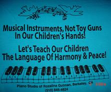 back of T-shirt; click on image to find out about using visual tool for having fun memorizing piano keys' names