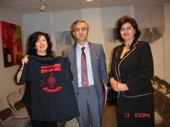Ms. Rozalina Gutman presented the advocacy message t-shirt, at the time of meeting with Mr. Joannis Andreades, Consul General of Greece and his wife, at the musical event, dedicated to the Holocaust in Saloniki, Foster City, JCC, 11.13.2010, discussing her upcoming project of Int'l Campaign for Music Education through Brain/Music Research at the upcoming 30th World Conference of ISME'2012, Thessaloniki, Greece, while enjoying very supportive remarks from them and the staff of the SF Greek Consulate.