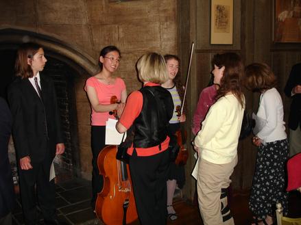 At the YAA Winners Reception at the Etude Club of Berkeley, CA, USA, May 2005. Preben Antonsen (left) is the 1st Prize winner of the newly established Original Composition Award. Etude Club members and their guests are greeting the Awards Winners.